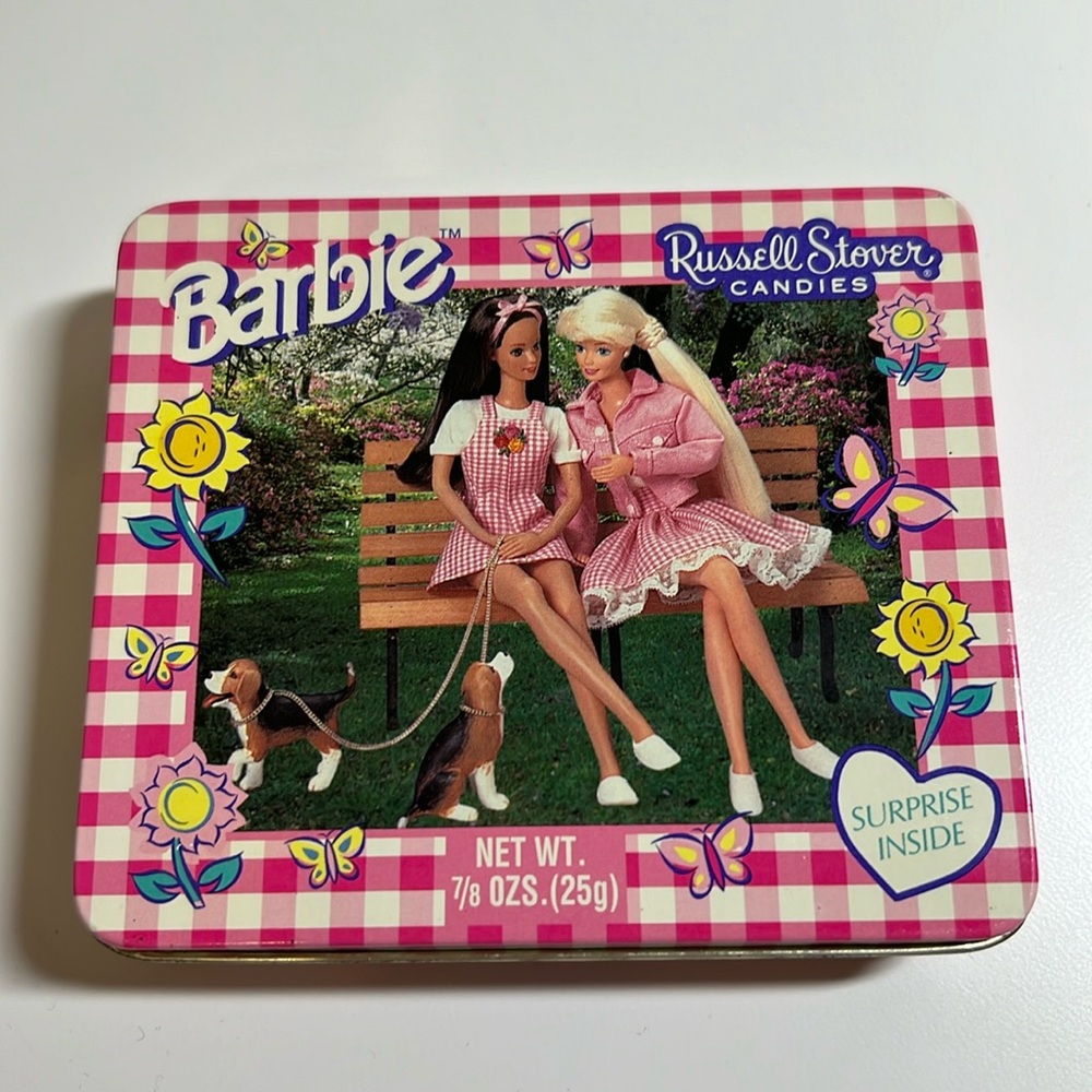 Vintage Barbie Russell Stover tin with stickers and stamp.